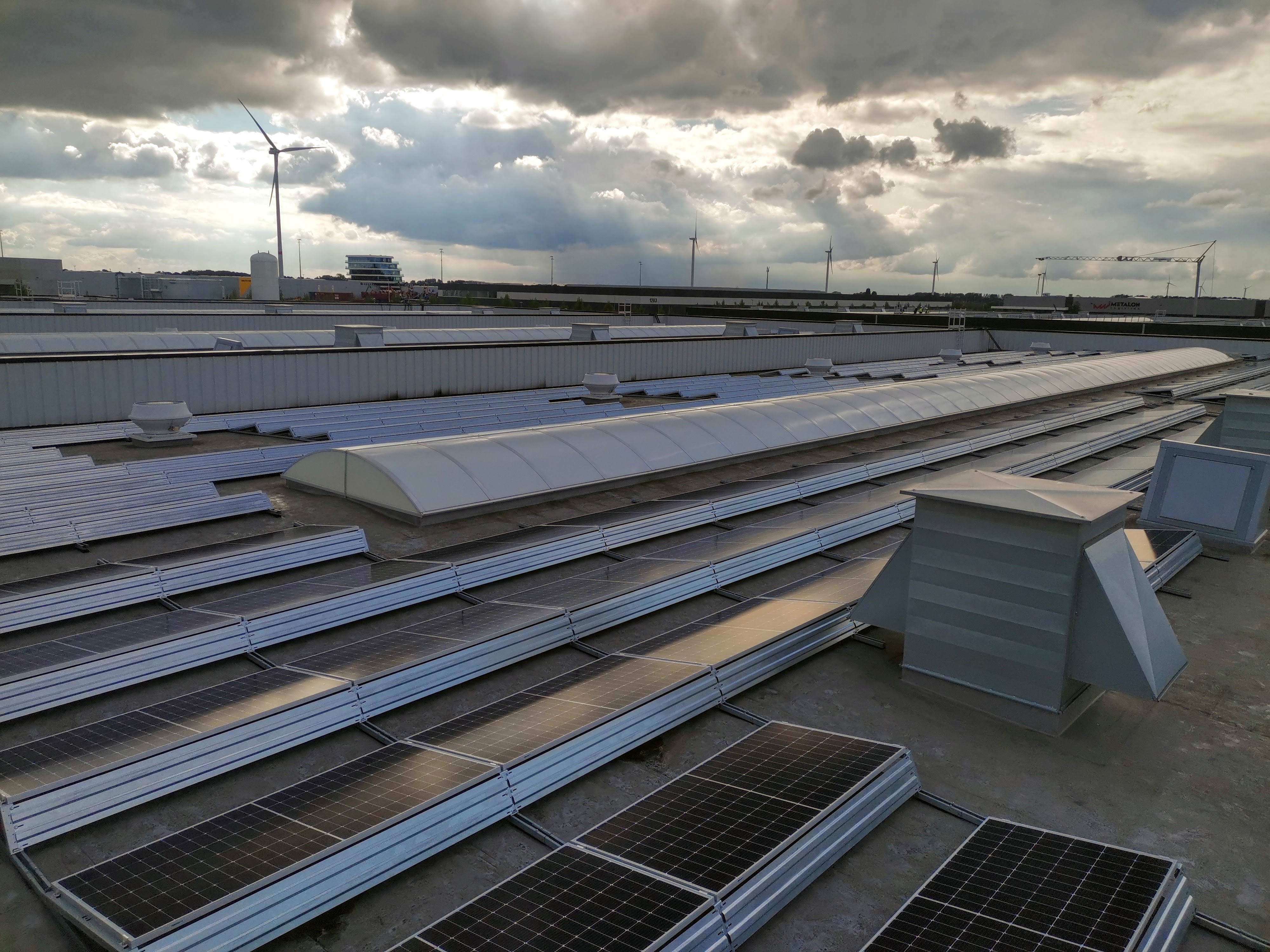 Industrial solar panels and energy infrastructure powering European factories