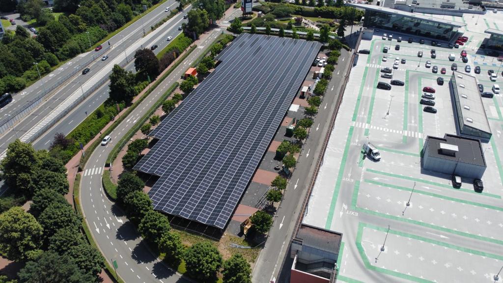 Industrial solar panels and energy infrastructure powering European factories